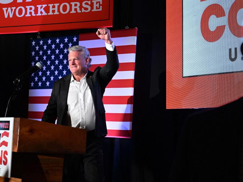 Rep. Mike Collins cheers at a campaign rally